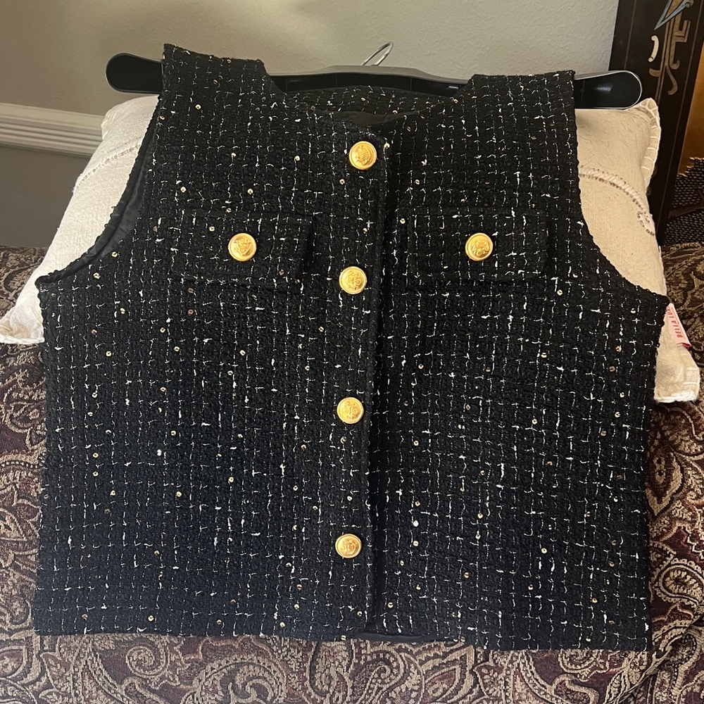 Stylish Black sleeveless Vest with Gold Buttons. Never worn, no tags.